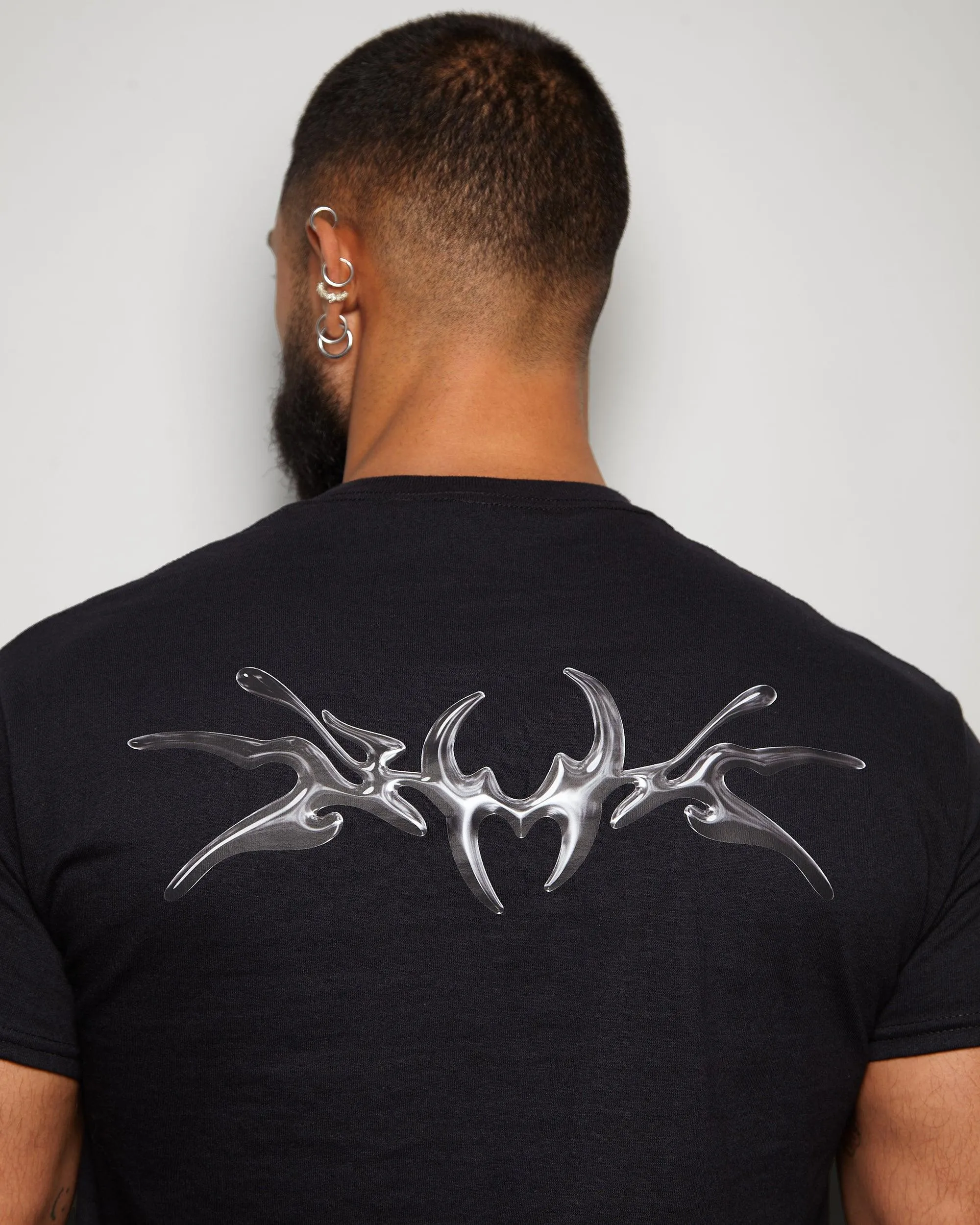 NXS002: Gunmetal style print on black muscle fit tee