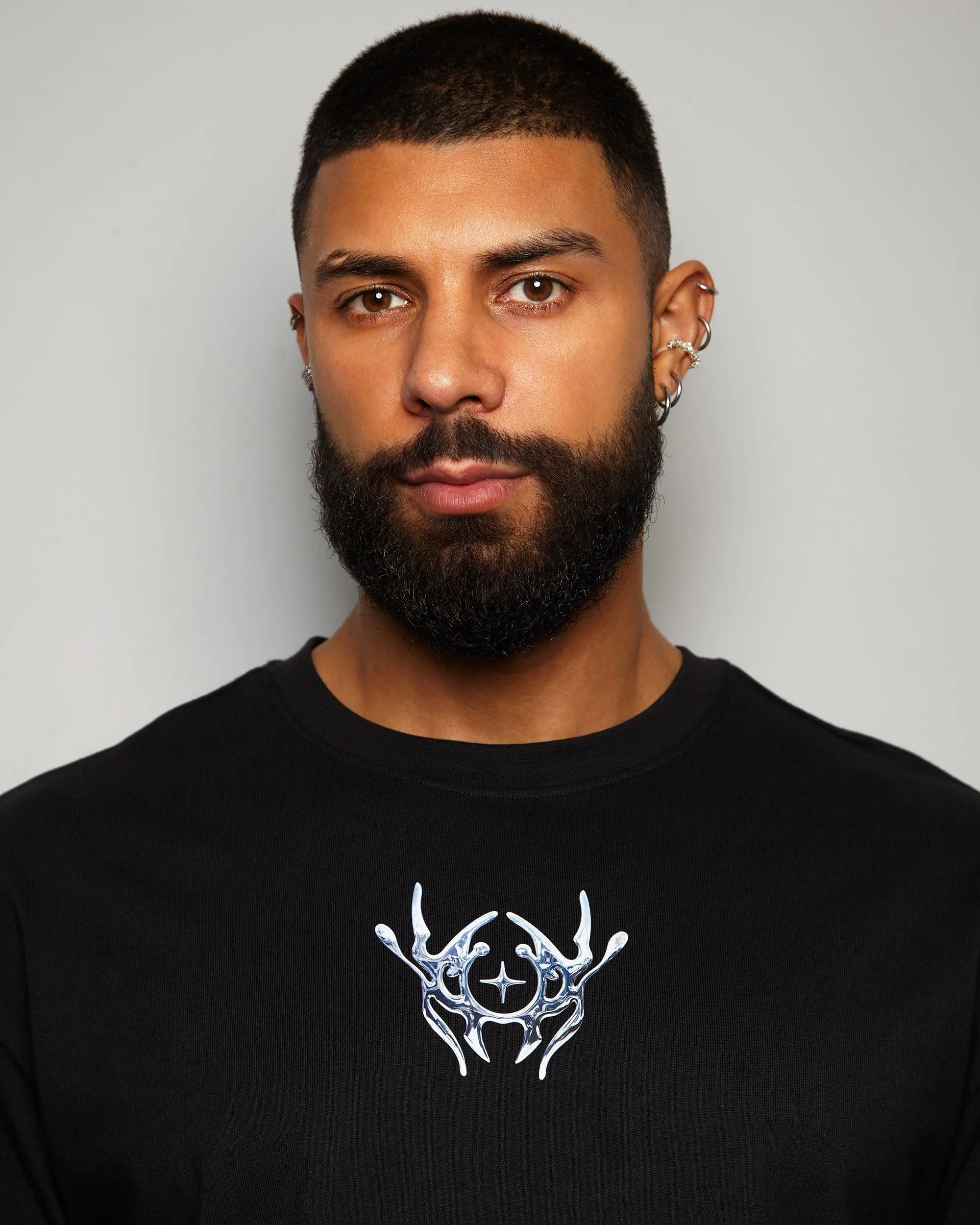NXS008: Silver style print on black heavy weight oversized tee.